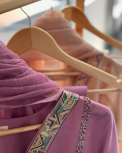 Soft Lavender Tones with Intricate Threadwork