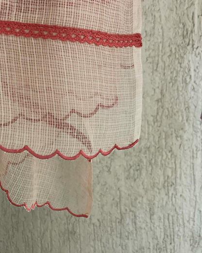 Soft Lavender Tones with Intricate Threadwork